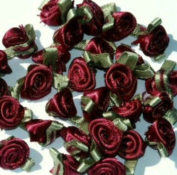 Satin ribbon roses with leaves