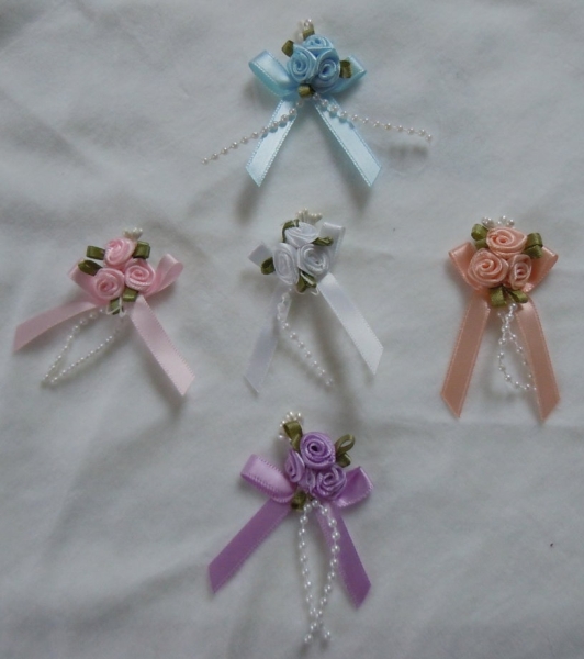 Triple ribbon rose bow